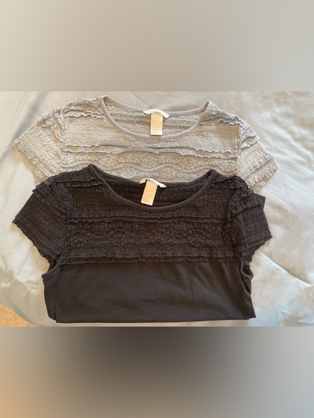 Lot of 2 H&M Short Sleeve Tops - Black and Blue/ Grey Lace Trim